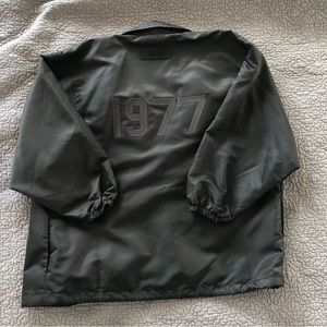 Fear of God Essentials coach jacket off black